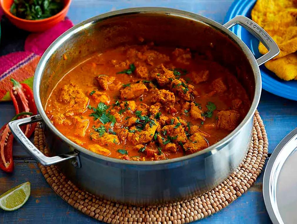 A Spicy Indian Chicken Tikka Masala with Trinidadian Doubles by Original Flava