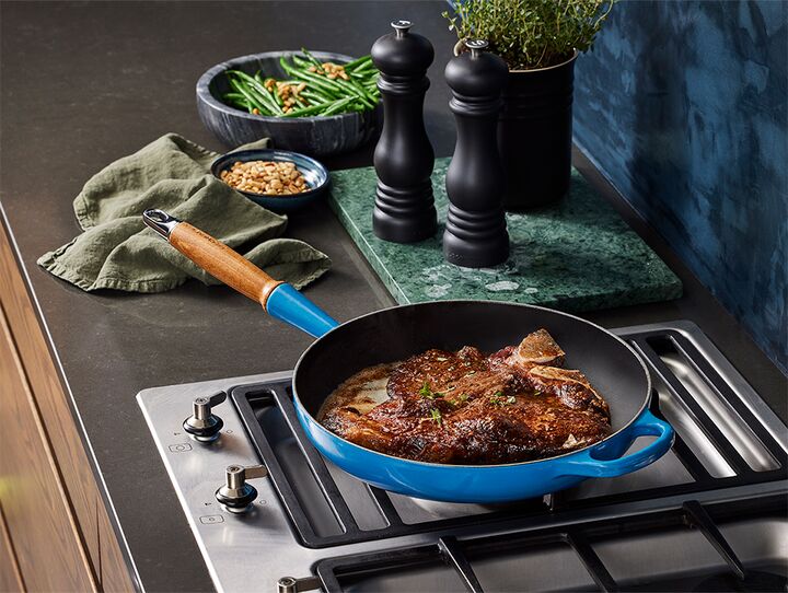 T bone with Black Garlic Butter and Fine Green Beans Le Creuset UK