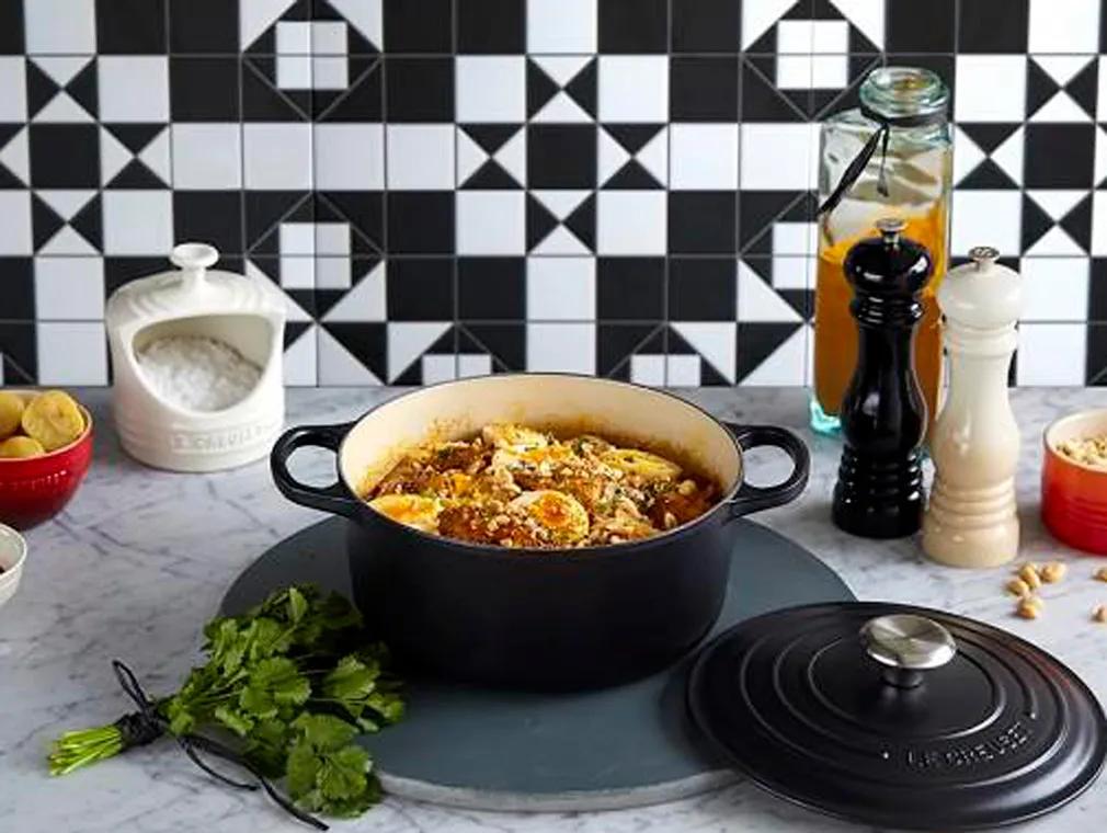 Peanut & Harissa Chicken Stew with Cannellini Beans, Eggs & Herb Crumb