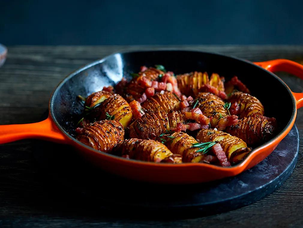 Hasselback Potato Skillet Bake With Smoked Sea Salt And Crispy Lardons